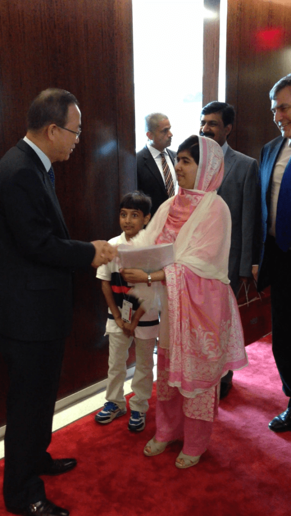 Secretary General of UN Ban Ki Moon greets Malala