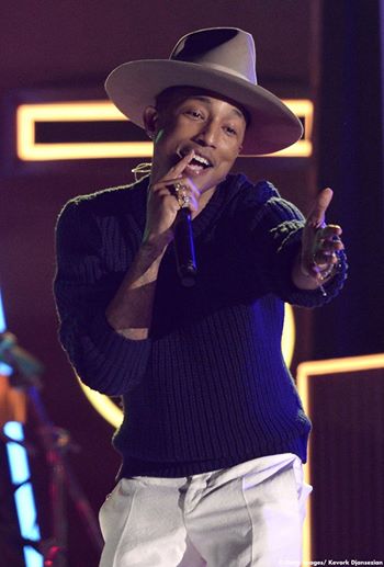 Pharrell with the magic hat singing about his "Happy"ness.  Image Courtesy: Facebook
