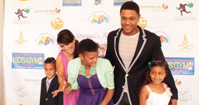 Pooch Hall walking the red carpet at his hosted event. Image Courtesy: KRNB.com